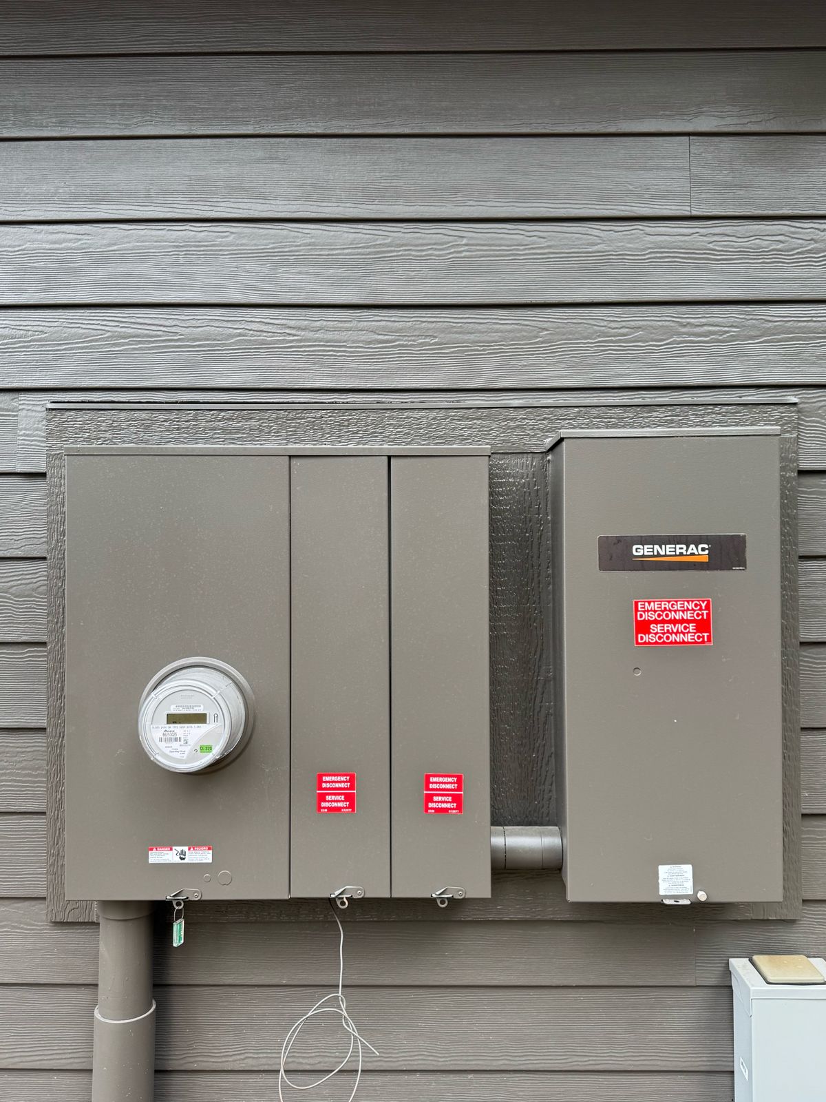 Electric meter and disconnects with a Generac transfer switch