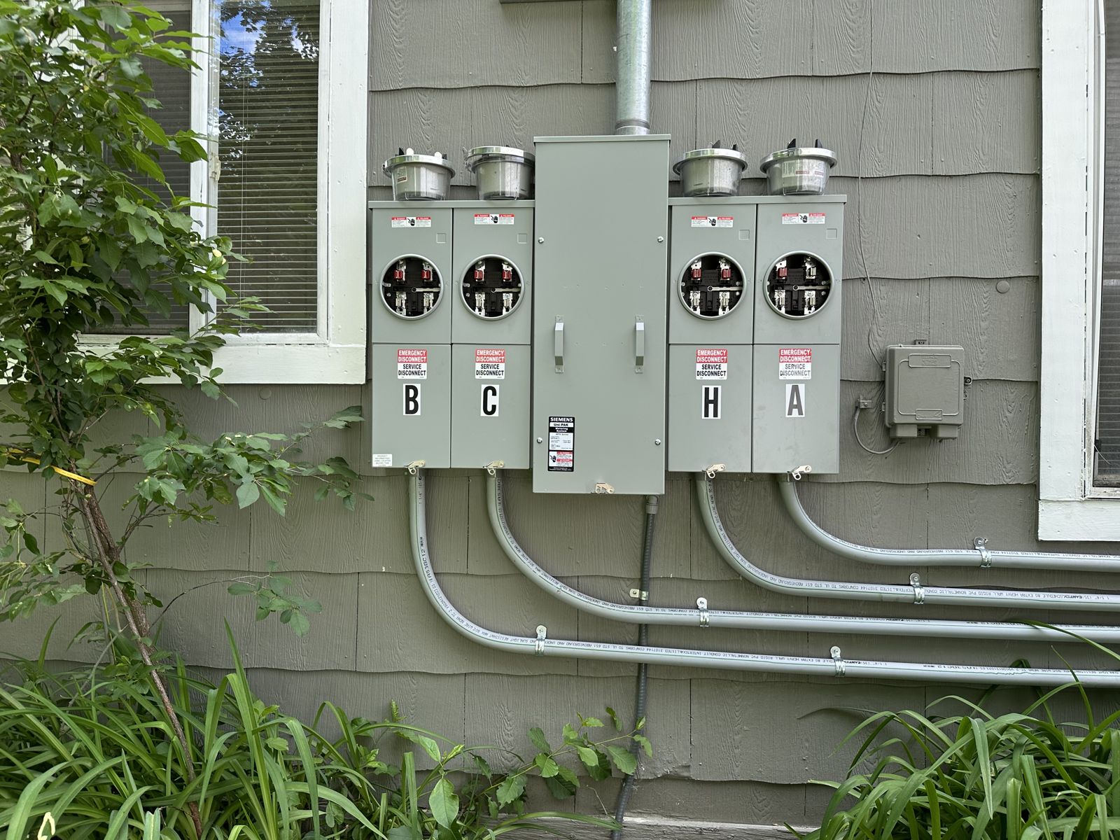 Close-up of a four-meter Siemens meter bank