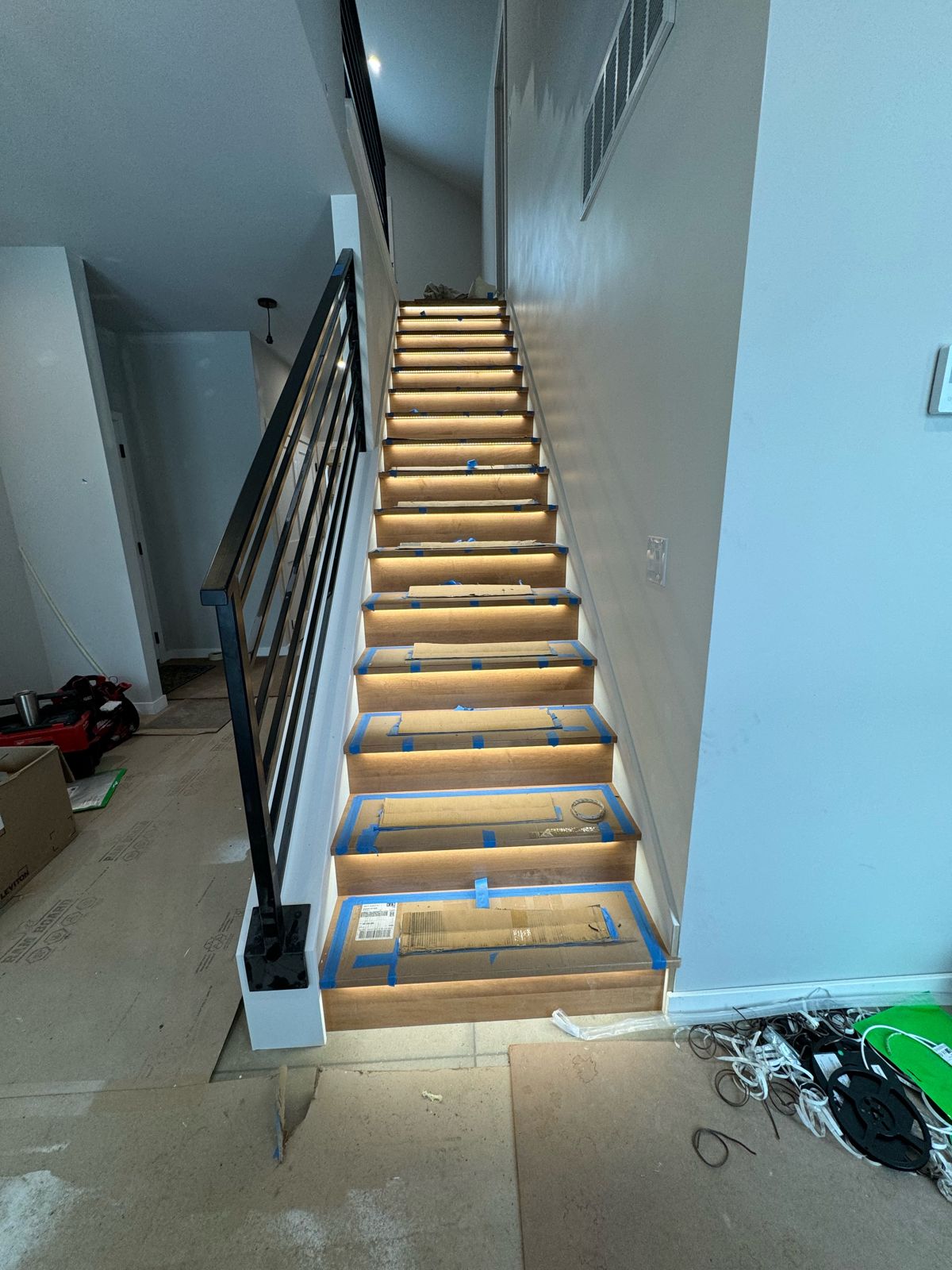 Stairs with LED step lights during construction