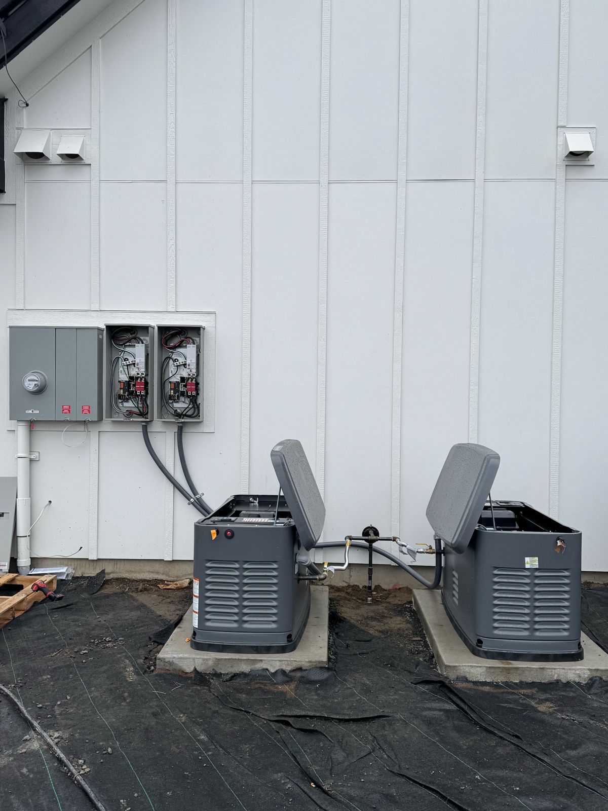 Pair of Honeywell standby generators and transfer switches, wired and ready